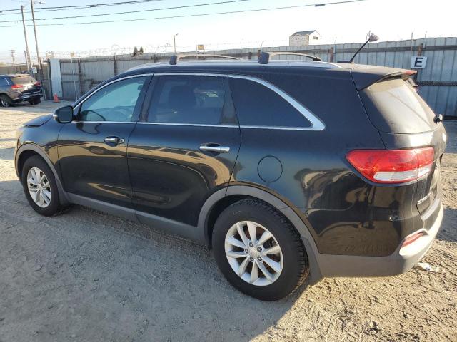 Photo 2 from auction – 2016 KIA SORENTO LX with VIN 5XYPG4A39GG091669