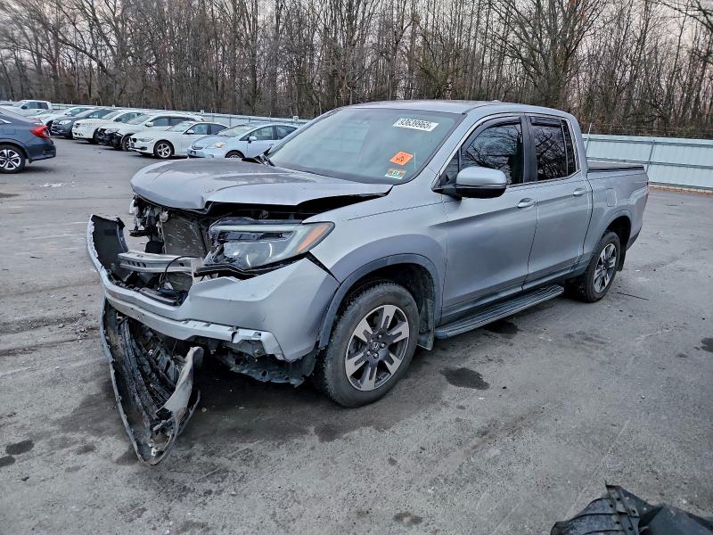 HONDA RIDGELINE 2017 with VIN 5FPYK3F65HB034109 - Photo from auction