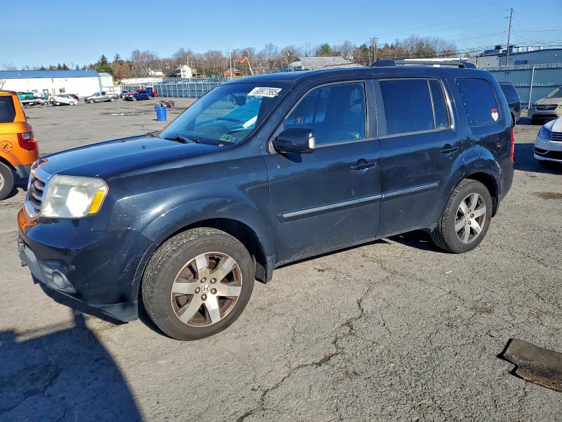 HONDA PILOT TOUR 2012 with VIN 5FNYF4H97CB077059 - Photo from auction