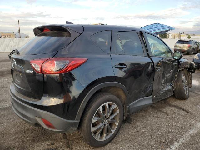 Photo 3 from auction – 2016 MAZDA CX-5 GT with VIN JM3KE2DY2G0902723
