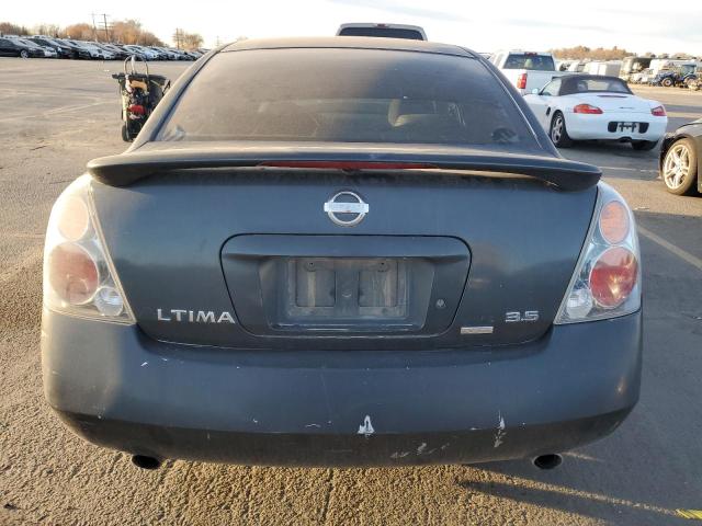Photo 6 from auction – 2002 NISSAN ALTIMA SE with VIN 1N4BL11E72C218024