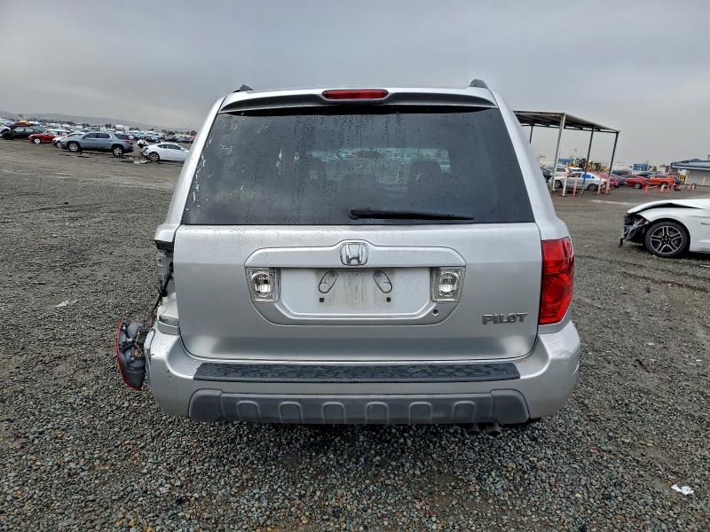 Photo 6 from auction – 2005 HONDA PILOT EX with VIN 2HKYF18475H571154
