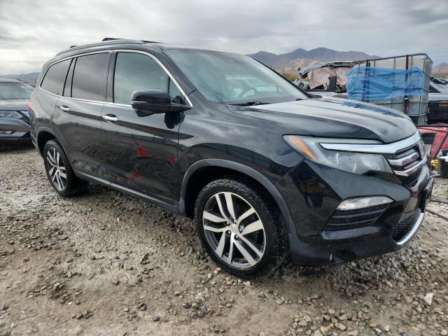 Photo 4 from auction – 2016 HONDA PILOT TOUR with VIN 5FNYF6H91GB124362