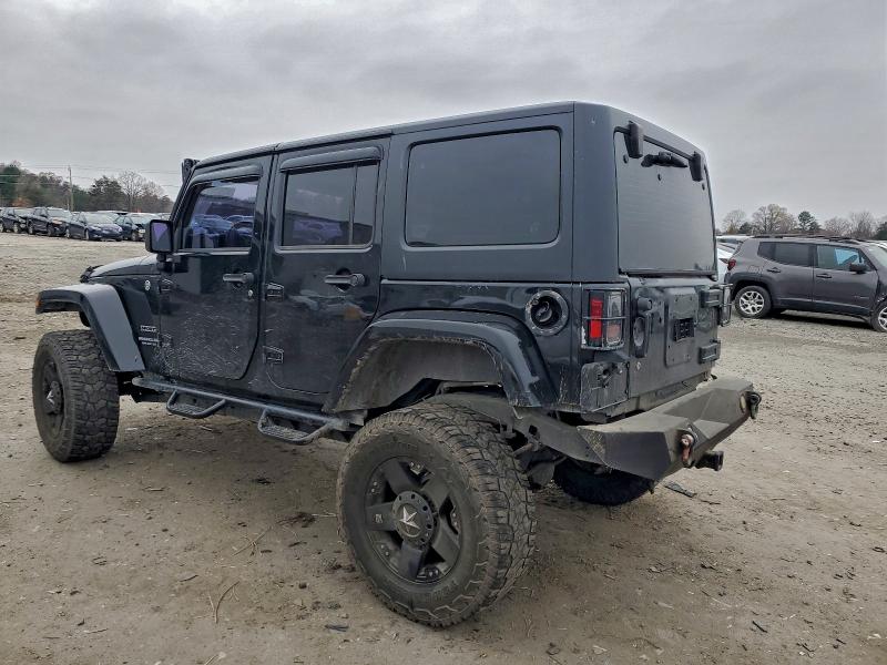 Photo 2 from auction – 2011 JEEP WRANGLER U with VIN 1J4BA3H1XBL565694