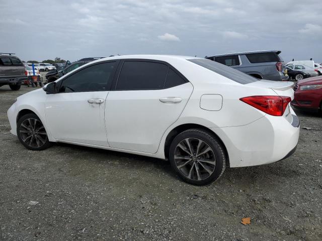 Photo 2 from auction – 2017 TOYOTA COROLLA L with VIN 5YFBURHE2HP696606