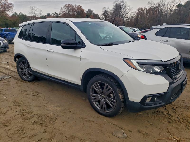 Photo 4 from auction – 2021 HONDA PASSPORT E with VIN 5FNYF8H59MB001820