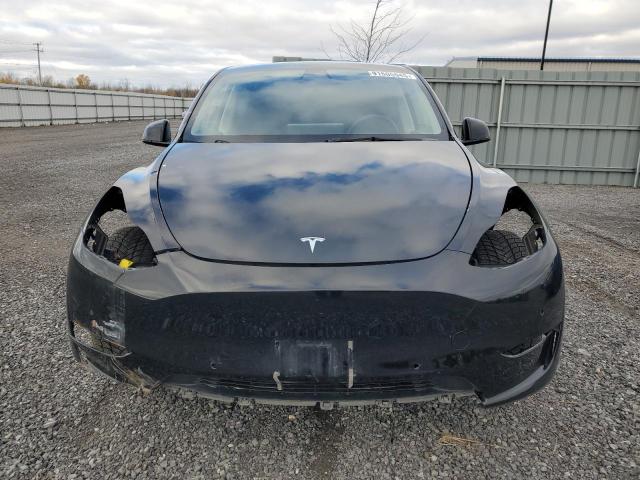 Photo 5 from auction – 2022 TESLA MODEL Y with VIN 7SAYGDEE3NF428408