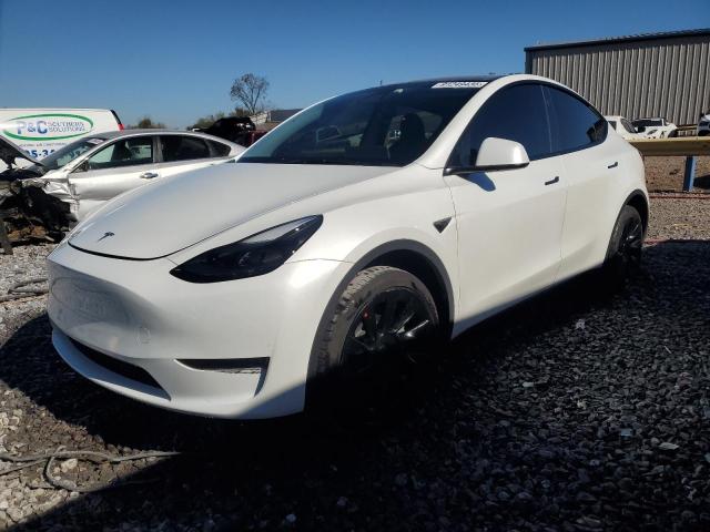 TESLA MODEL Y 2024 with VIN 7SAYGDED7RF002864 - Photo from auction