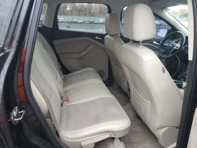 Photo 11 from auction – 2016 FORD ESCAPE TIT with VIN 1FMCU9J90GUC00653