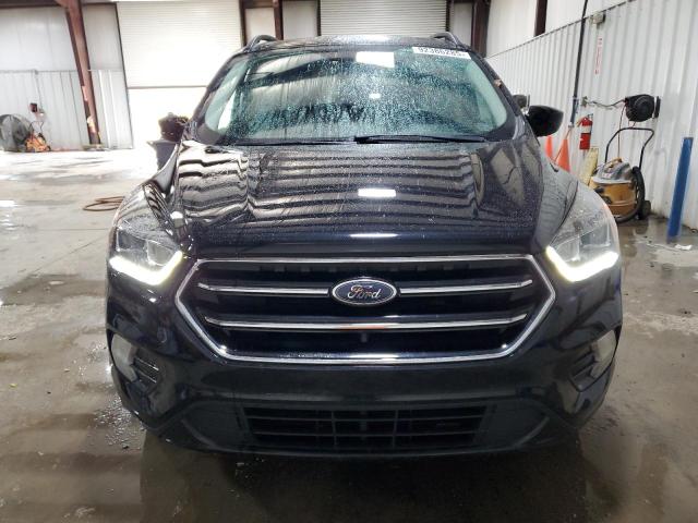 Photo 5 from auction – 2018 FORD ESCAPE SE with VIN 1FMCU9GD5JUD35033
