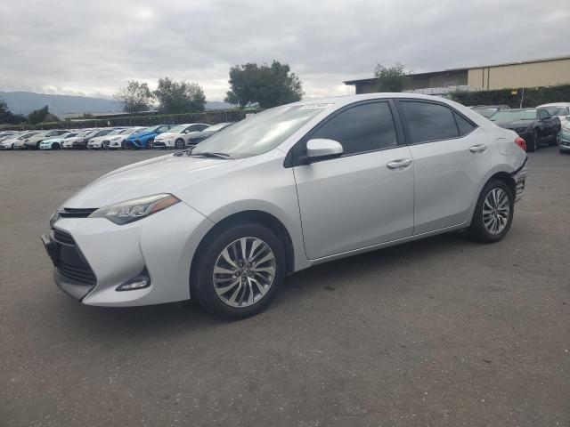 TOYOTA COROLLA L 2018 with VIN 2T1BURHE3JC970207 - Photo from auction