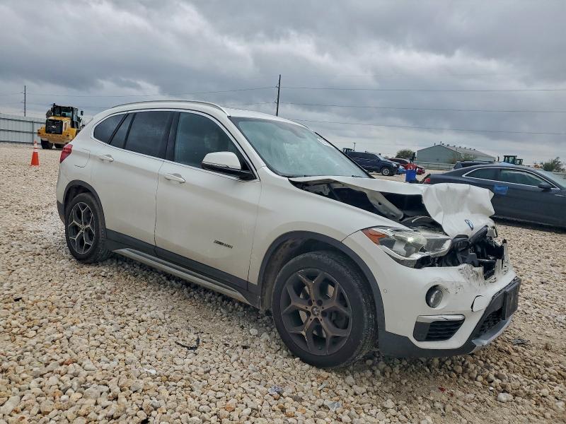 Photo 4 from auction – 2017 BMW X1 XDRIVE2 with VIN WBXHT3C32H5F81765