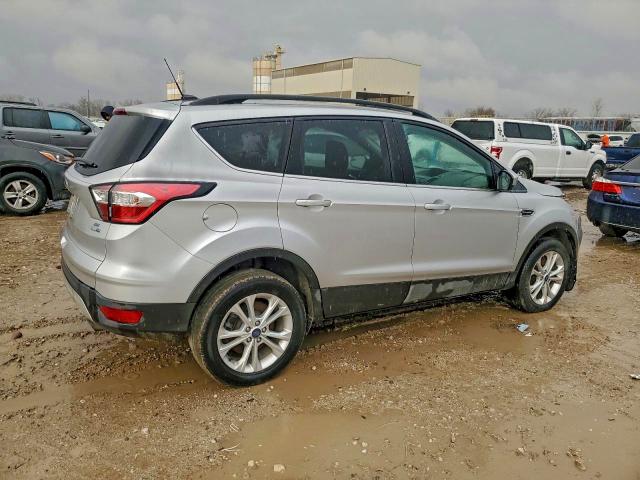 Photo 3 from auction – 2018 FORD ESCAPE with VIN 1FMCU9GD8JUB29334
