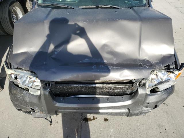 Photo 11 from auction – 2004 FORD ESCAPE LIM with VIN 1FMCU94194KA51124
