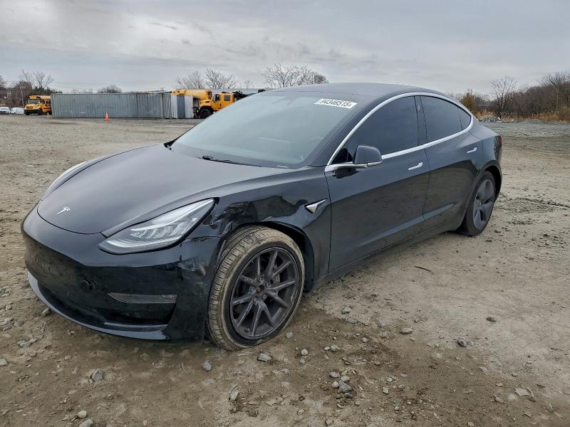 TESLA MODEL 3 2018 with VIN 5YJ3E1EB9JF118629 - Photo from auction