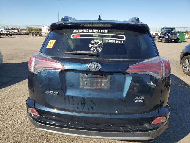 Photo 6 from auction – 2017 TOYOTA RAV4 XLE with VIN JTMRFREV5HJ704392