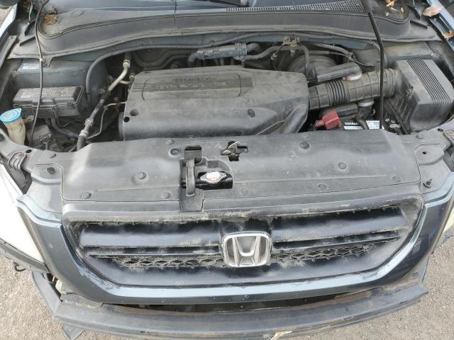 Photo 12 from auction – 2003 HONDA PILOT LX with VIN 2HKYF18153H527723