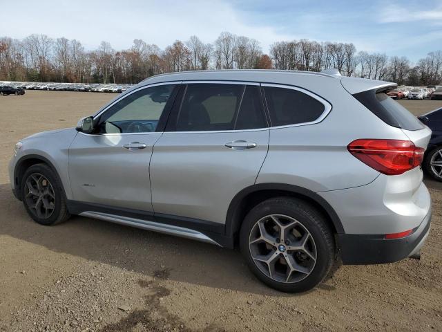 Photo 2 from auction – 2017 BMW X1 XDRIVE2 with VIN WBXHT3C3XH5F76314