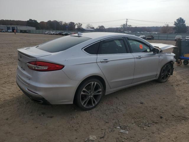 Photo 3 from auction – 2019 FORD FUSION TIT with VIN 3FA6P0D98KR139588