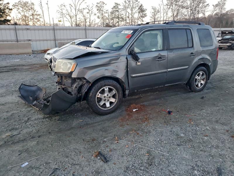 Photo 1 from auction – 2009 HONDA PILOT TOUR with VIN 5FNYF38869B002640