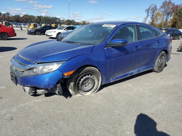 HONDA CIVIC LX 2018 with VIN 2HGFC2F57JH584136 - Photo from auction