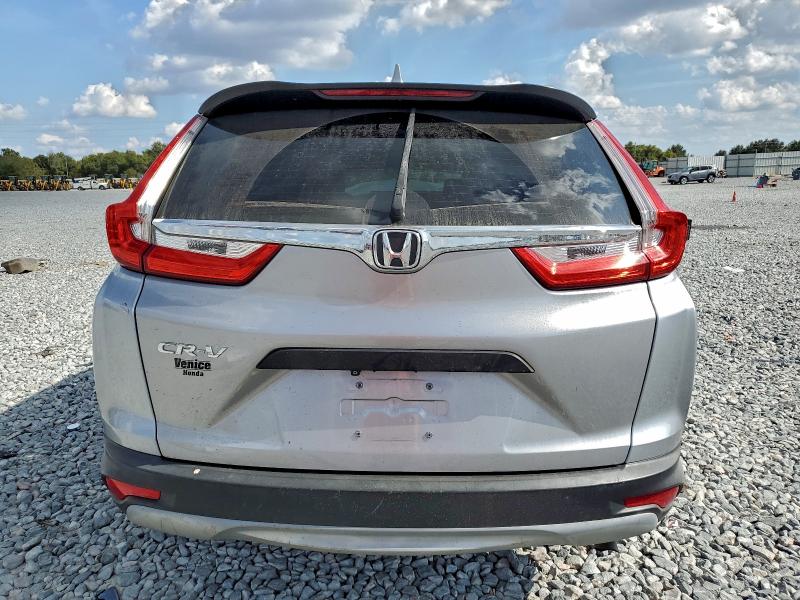 Photo 6 from auction – 2019 HONDA CR-V LX with VIN 2HKRW5H34KH422683