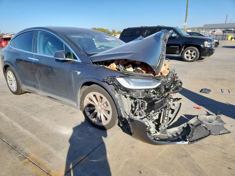 Photo 4 from auction – 2018 TESLA MODEL X with VIN 5YJXCAE20JF112872