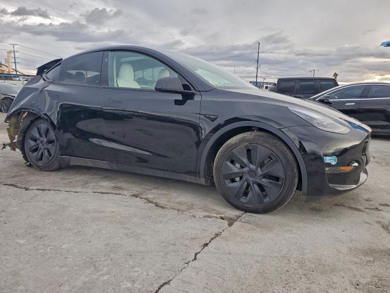 Photo 4 from auction – 2025 TESLA MODEL Y with VIN 7SAYGDEE8SF239703