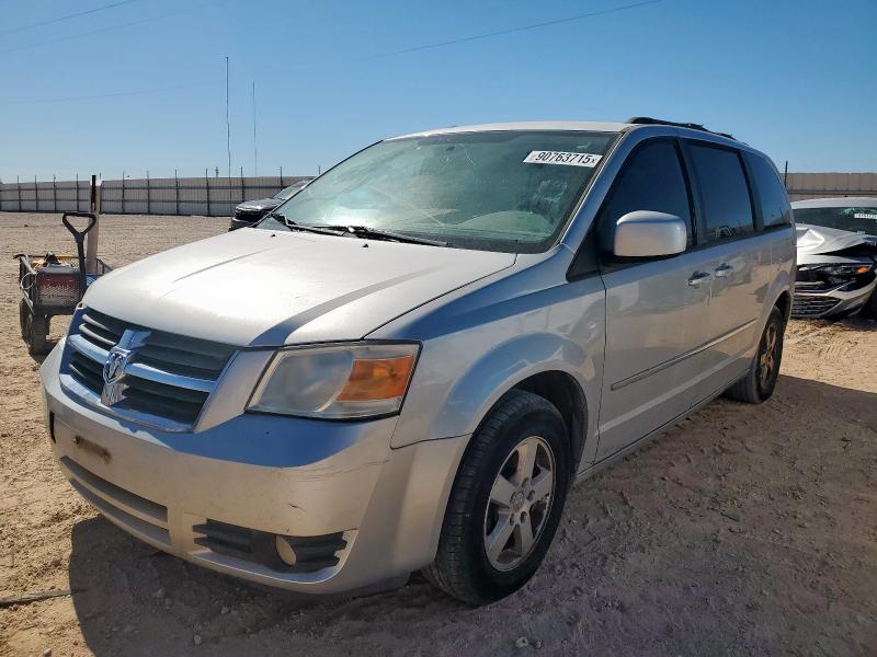 DODGE CARAVAN 2010 with VIN 2D4RN5D16AR146647 - Photo from auction