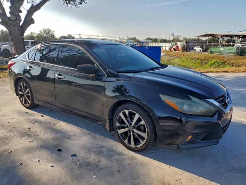 Photo 4 from auction – 2016 NISSAN ALTIMA 2.5 with VIN 1N4AL3APXGC184726