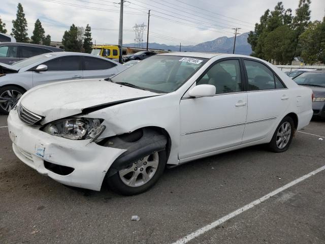 TOYOTA CAMRY LE 2005 with VIN 4T1BF30K55U086847 - Photo from auction