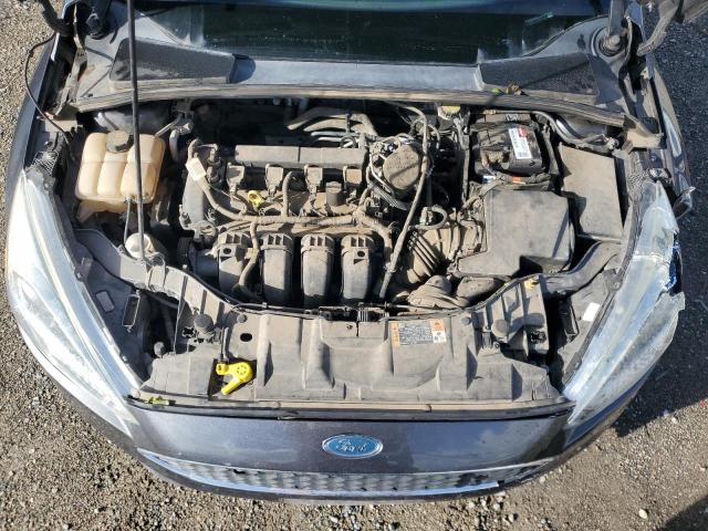 Photo 11 from auction – 2016 FORD FOCUS S with VIN 1FADP3E25GL234593