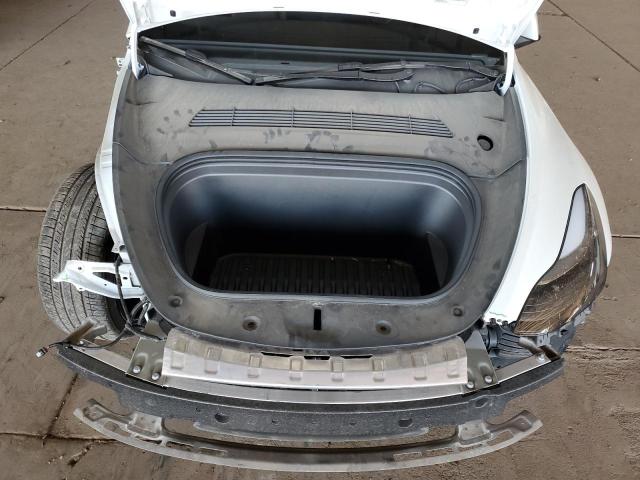 Photo 12 from auction – 2023 TESLA MODEL Y with VIN 7SAYGDEF8PF971703