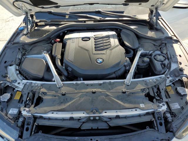 Photo 11 from auction – 2023 BMW 840I with VIN WBAGV2C04PCM45449