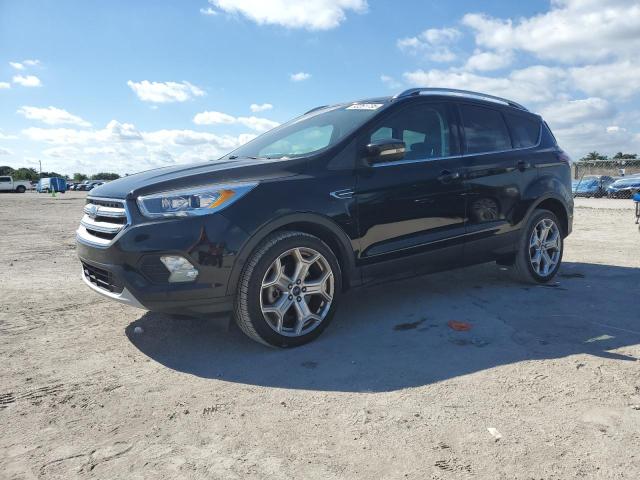 FORD ESCAPE TIT 2017 with VIN 1FMCU9J91HUE85901 - Photo from auction