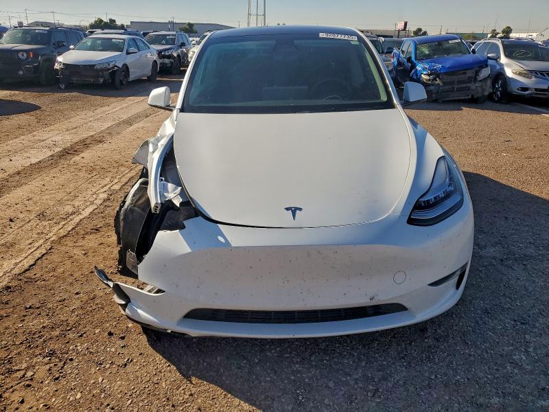 Photo 5 from auction – 2023 TESLA MODEL Y with VIN 7SAYGDEE4PA097869