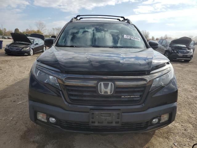 Photo 5 from auction – 2017 HONDA RIDGELINE with VIN 5FPYK3F82HB010707