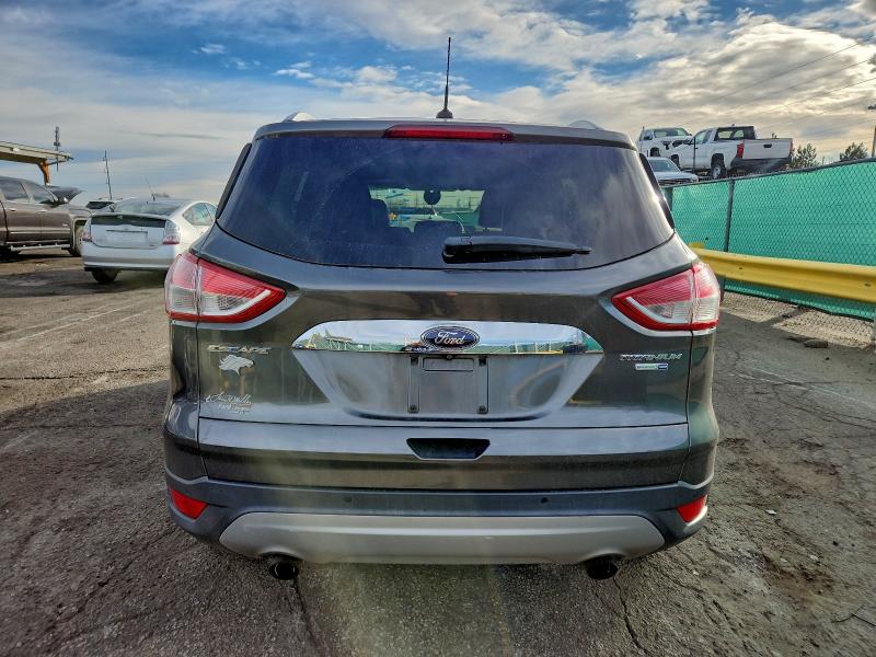 Photo 6 from auction – 2015 FORD ESCAPE TIT with VIN 1FMCU9J99FUB72575
