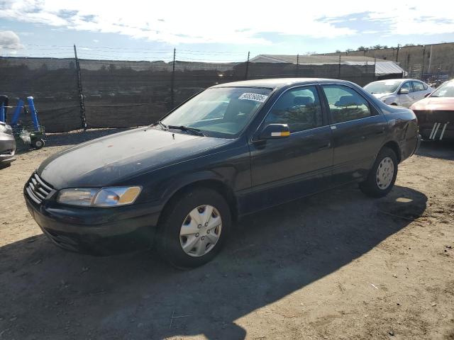 TOYOTA CAMRY CE 1997 with VIN 4T1BG22K9VU057629 - Photo from auction