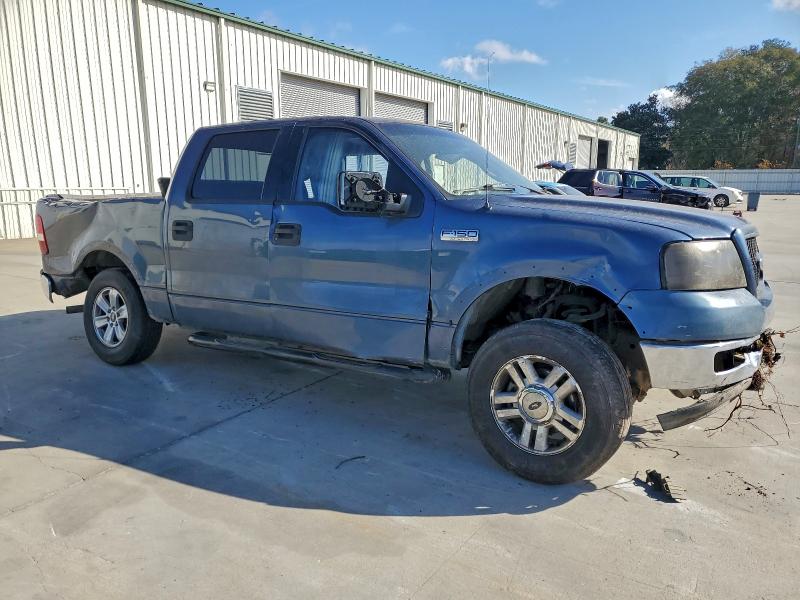 Photo 4 from auction – 2004 FORD F150 with VIN 1FTPW14504KC75614