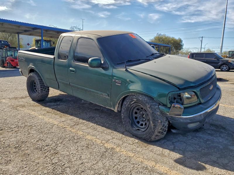 Photo 4 from auction – 2000 FORD F150 with VIN 2FTRX18L7YCA32861
