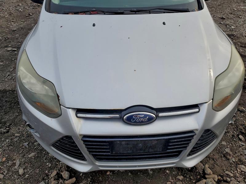 Photo 11 from auction – 2013 FORD FOCUS SE with VIN 1FADP3K2XDL103448
