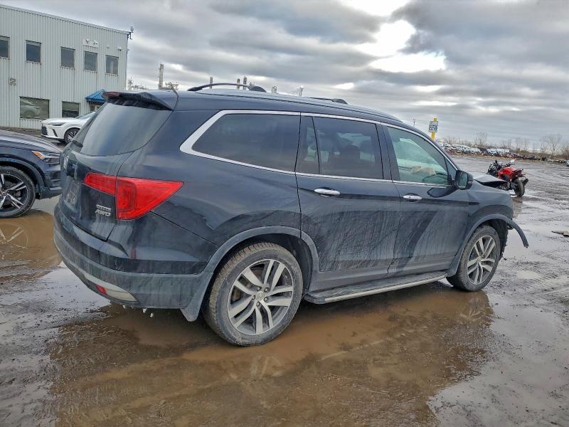 Photo 3 from auction – 2017 HONDA PILOT TOUR with VIN 5FNYF6H99HB507192