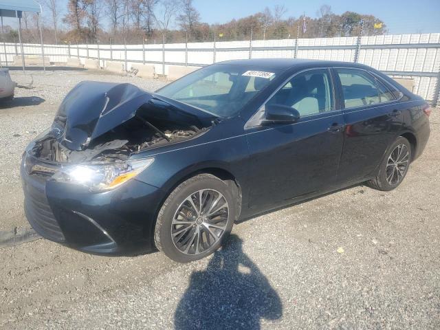 TOYOTA CAMRY LE 2016 with VIN 4T4BF1FK3GR573680 - Photo from auction