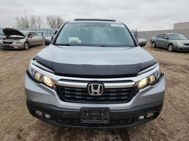 Photo 5 from auction – 2019 HONDA RIDGELINE with VIN 5FPYK3F61KB027603
