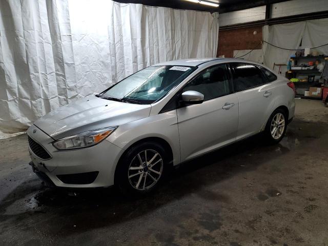 FORD FOCUS SE 2015 with VIN 1FADP3F21FL205654 - Photo from auction