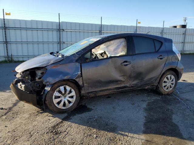 TOYOTA PRIUS C 2014 with VIN JTDKDTB35E1071749 - Photo from auction
