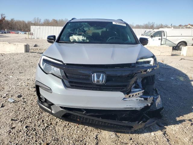 Photo 5 from auction – 2022 HONDA PILOT TRAI with VIN 5FNYF6H85NB094299