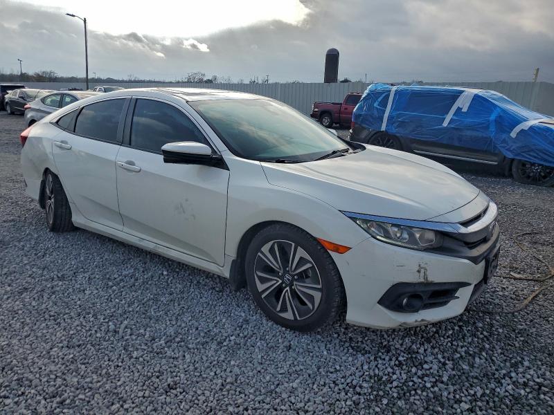 Photo 4 from auction – 2017 HONDA CIVIC with VIN 19XFC1F33HE026698