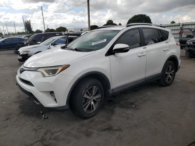 TOYOTA RAV4 2018 with VIN 2T3WFREV4JW516764 - Photo from auction
